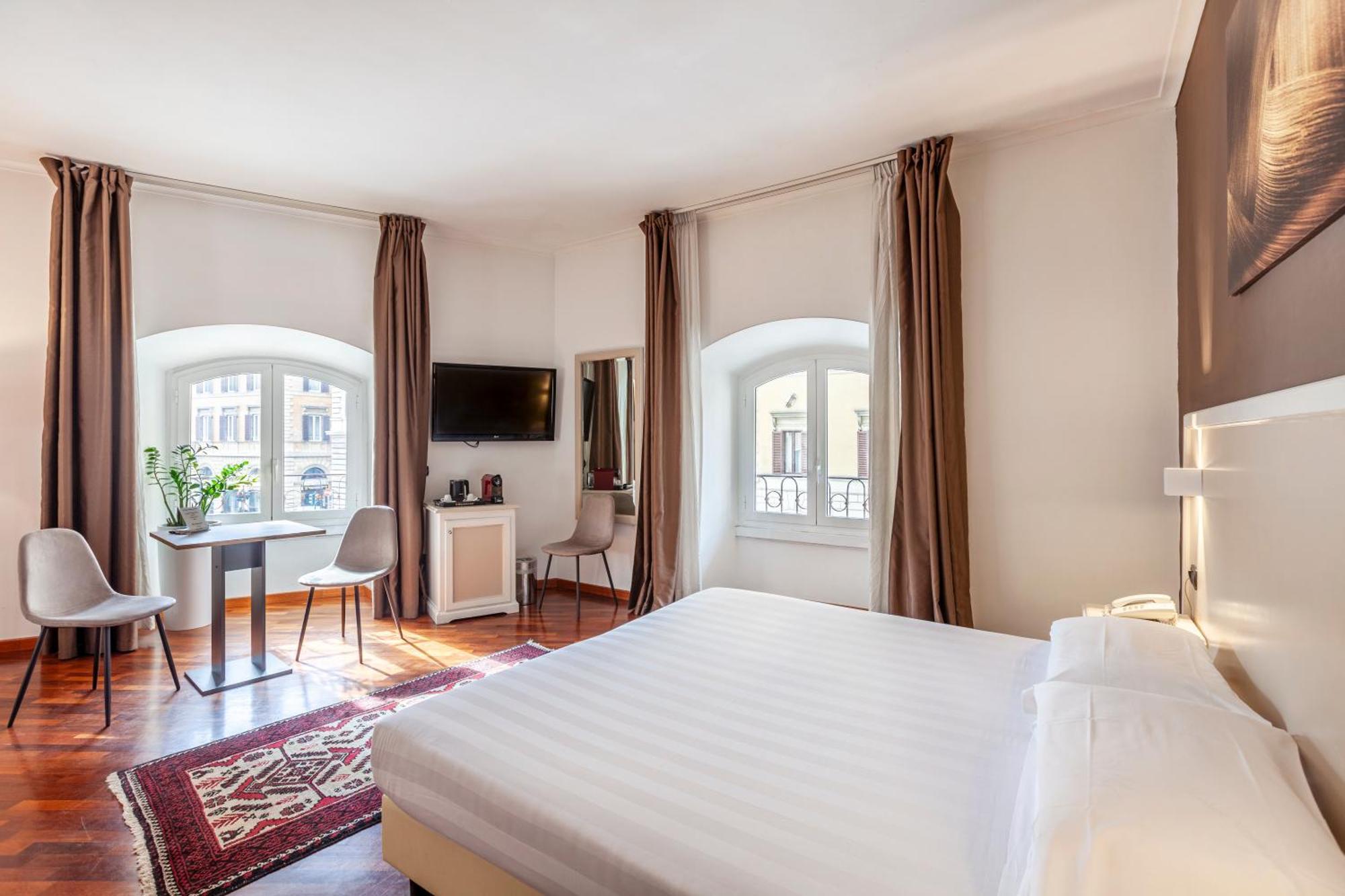 Inn Rome Rooms & Suites — Foto 2